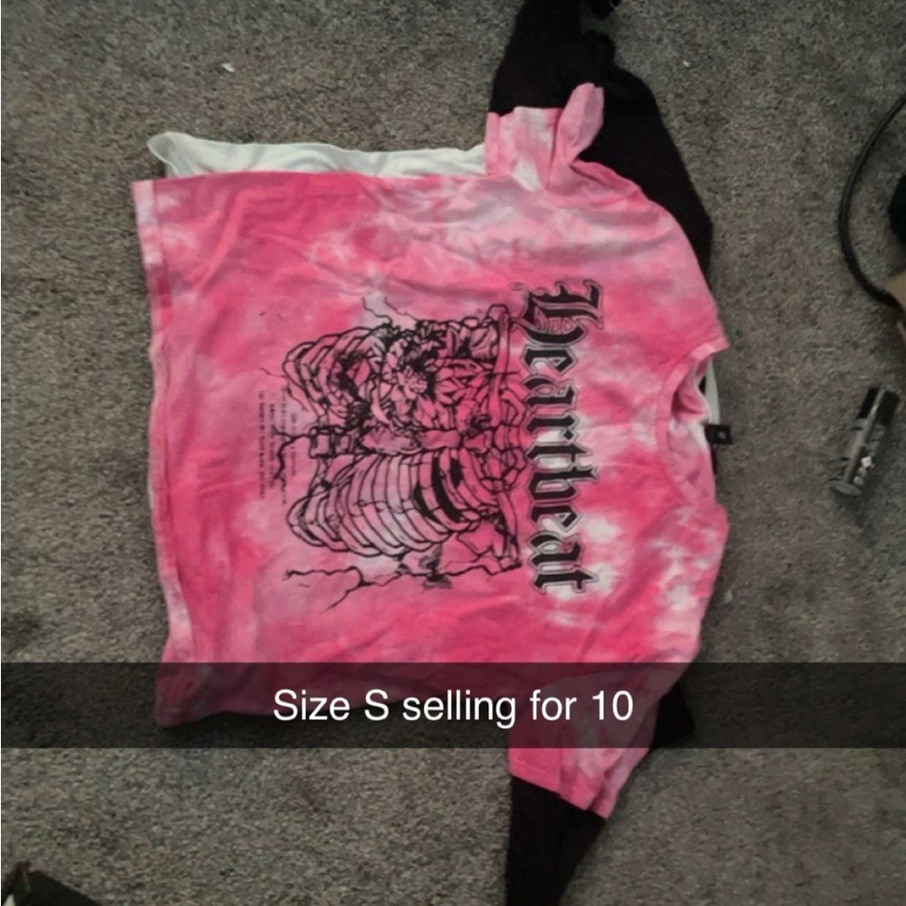Multiple shirts that are same price and same style
